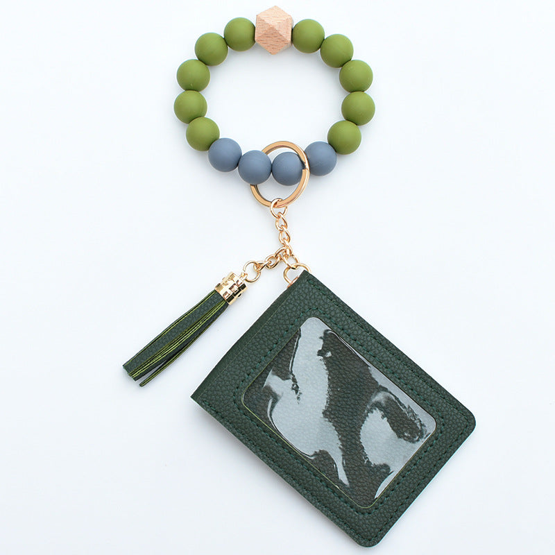 Comercio al por mayor Cuentas de silicona PU Titular de la tarjeta de color sólido Llavero de muñeca